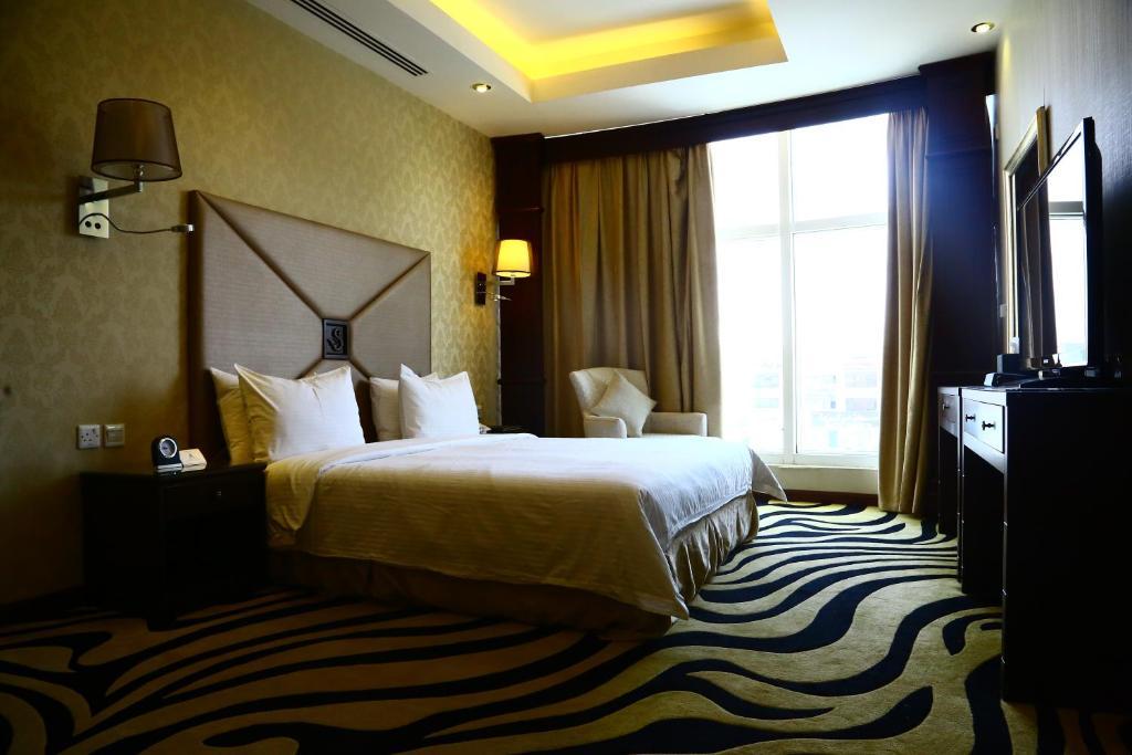 Sanam Hotel Suites - Riade Quarto foto